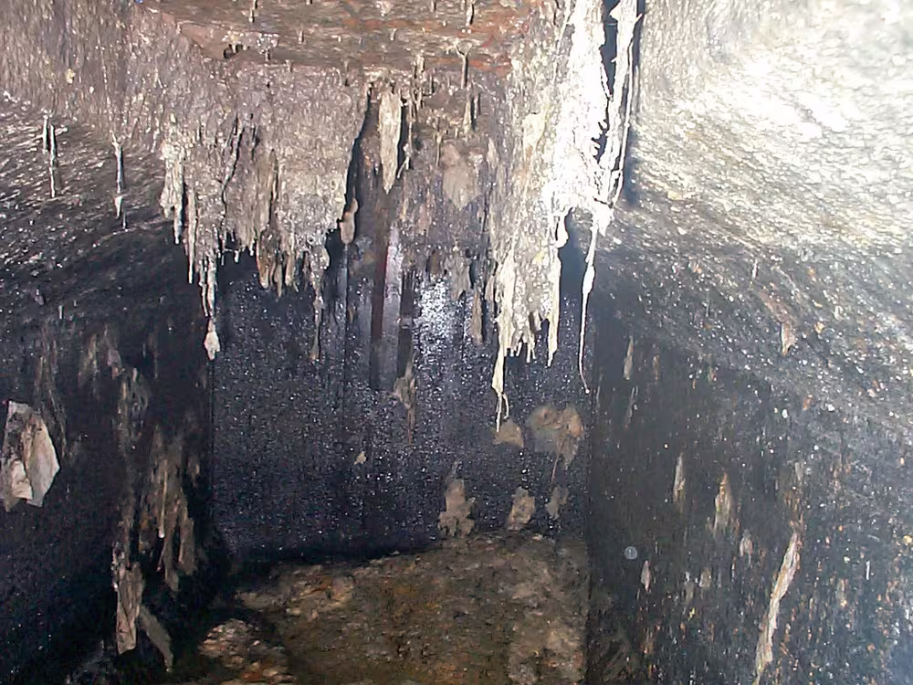 The inlet baffle inside a septic tank